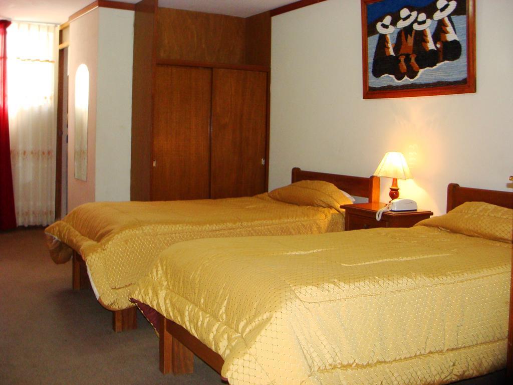 Gran Puno Inn Quarto foto