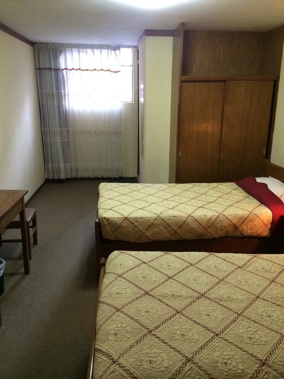 Gran Puno Inn Quarto foto
